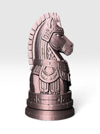 A knight chess piece statue shaped like a horse head with detailed mayan armor and a circular base, shown against a white - light grey gradient background. 